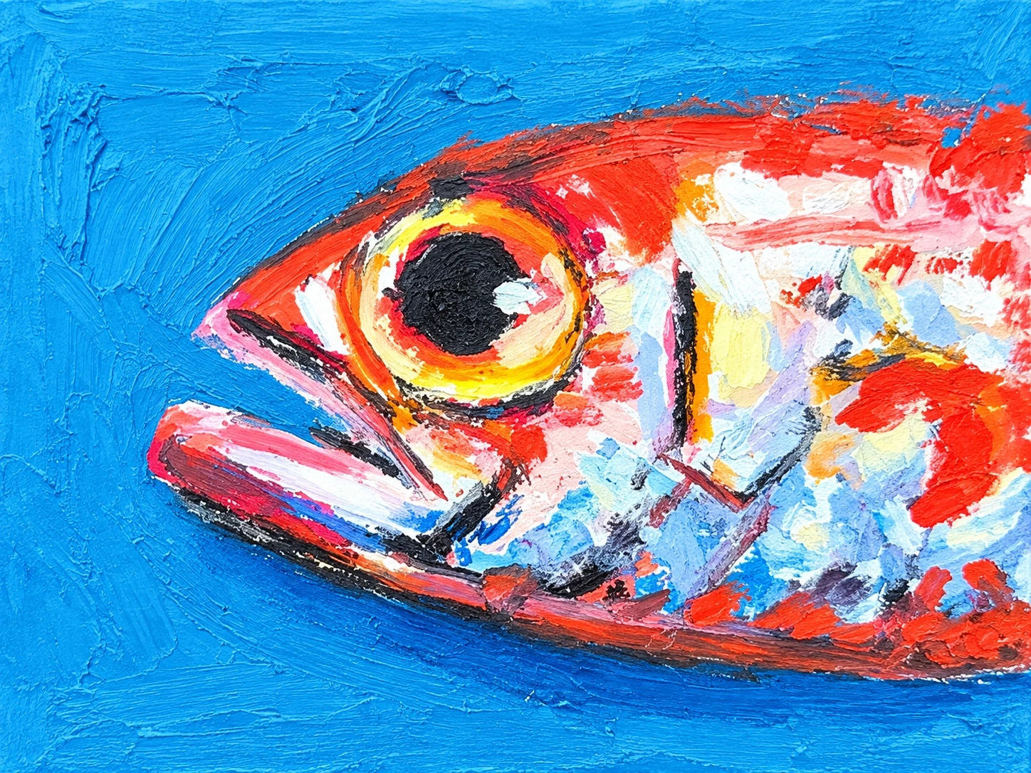 Red fish painting on a blue background